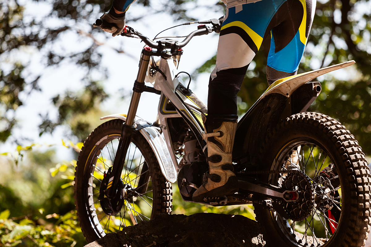 rials,Motorcycle,While,Competition,In,Nature,Park,,Close,Up,Shot